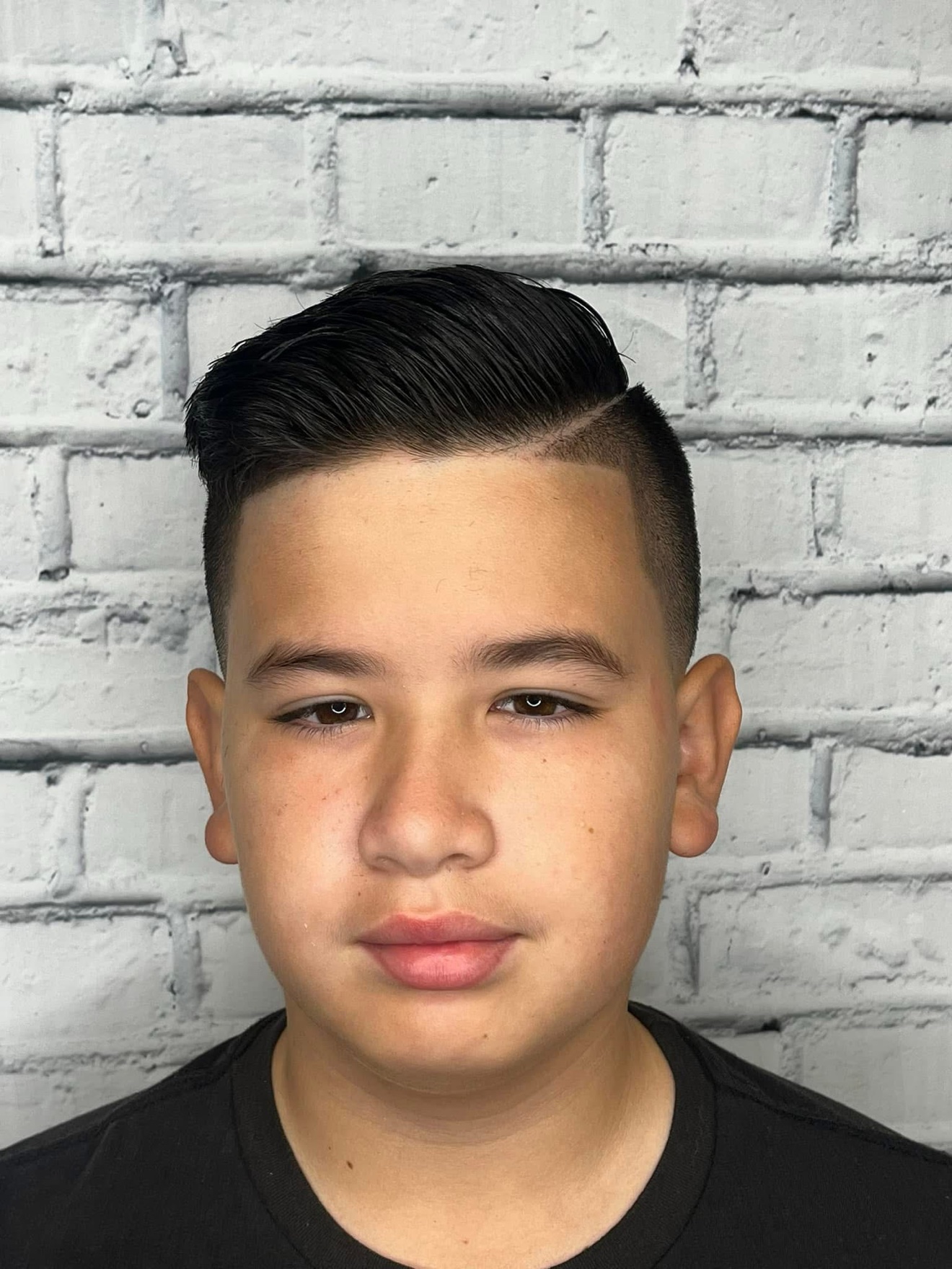 Comb-over with a hard part and fade, front view, by Danny at D&H Hair Company