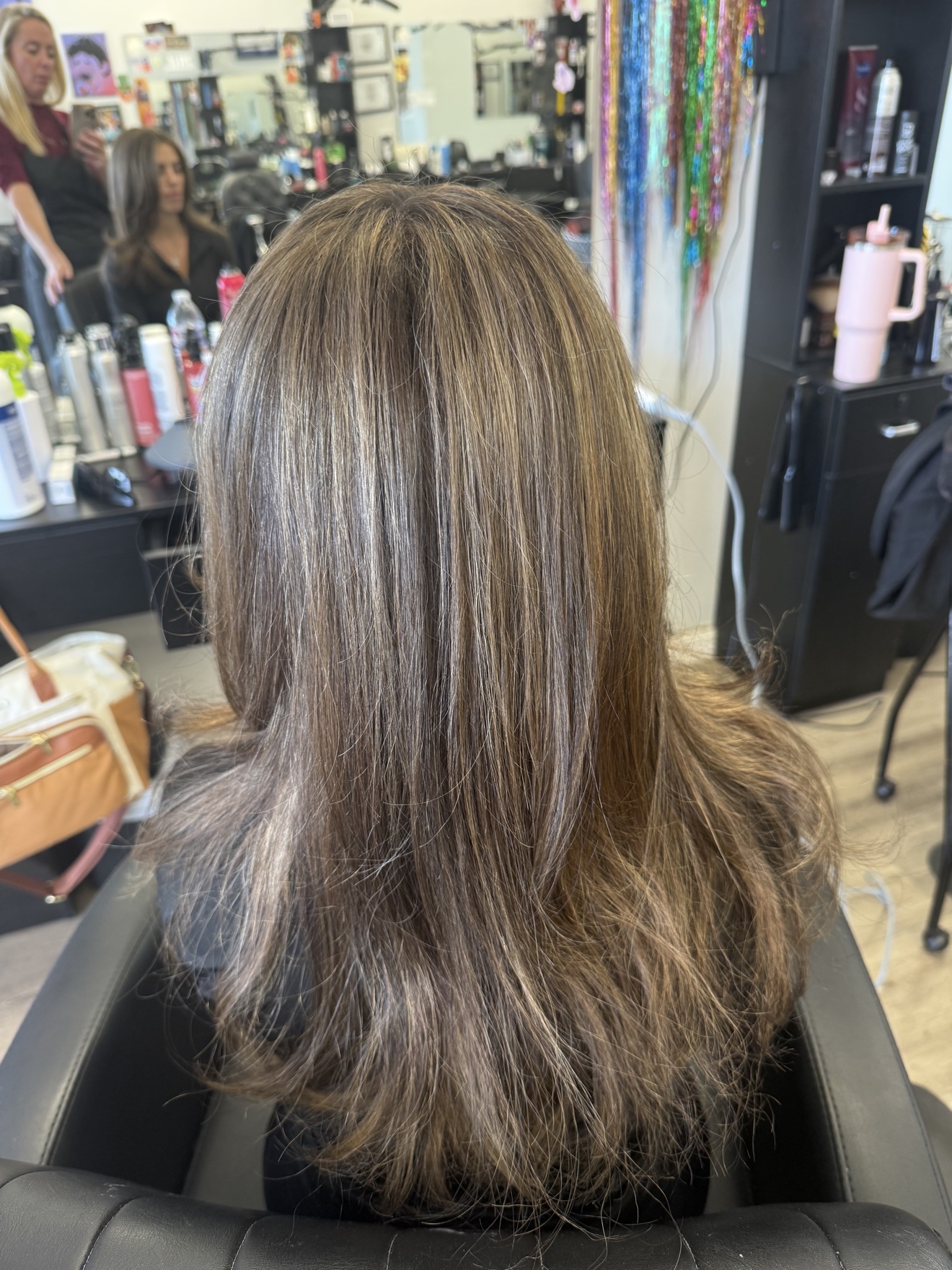 Long brunette hair with ash blonde highlights, back view, by Heather at D&H Hair Company