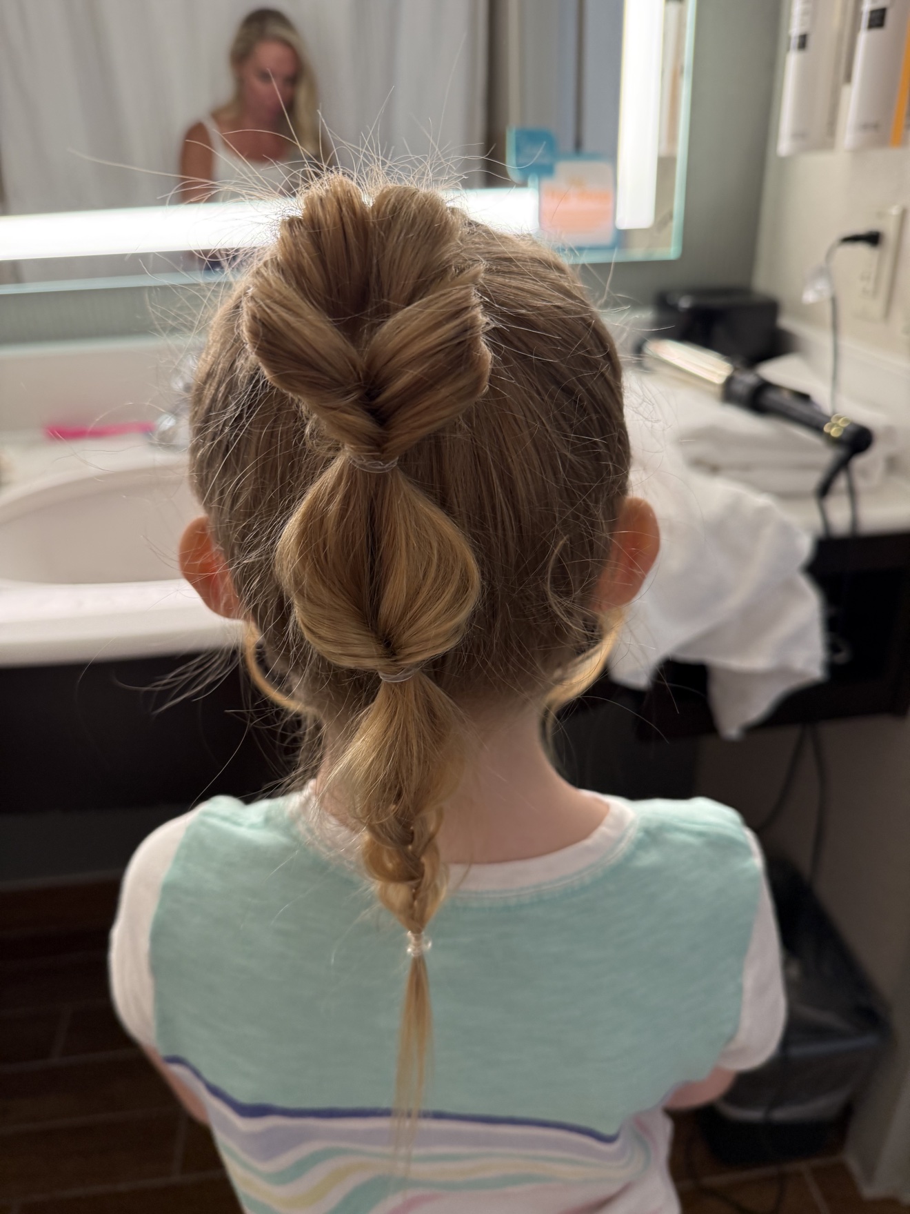 Bubble braid ponytail on a young client, back view, by Heather at D&H Hair Company