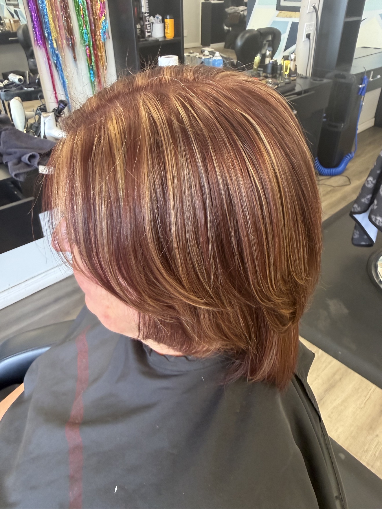 Layered copper haircut, side view, by Heather at D&H Hair Company