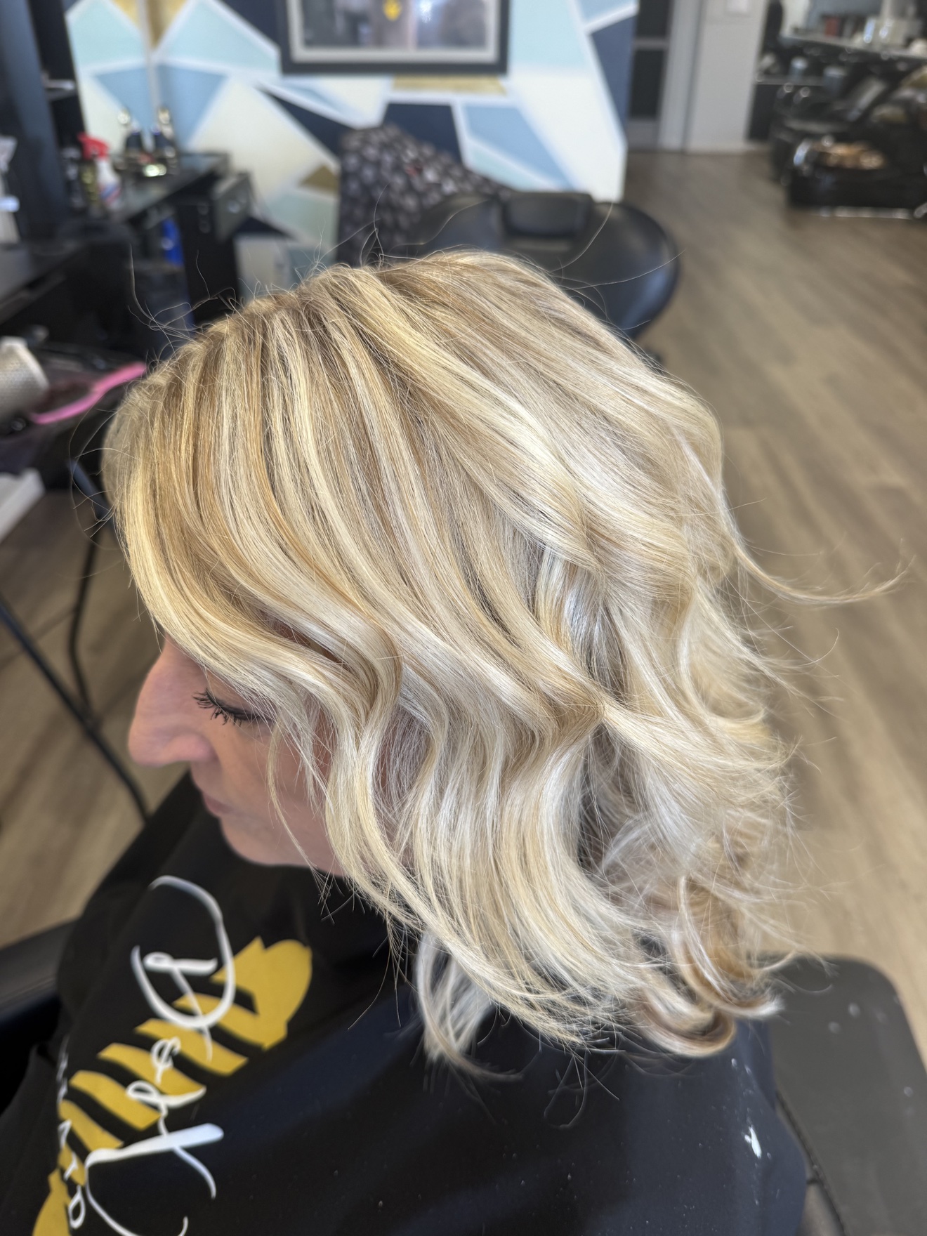 Wavy platinum blonde hair, side view, by Heather at D&H Hair Company