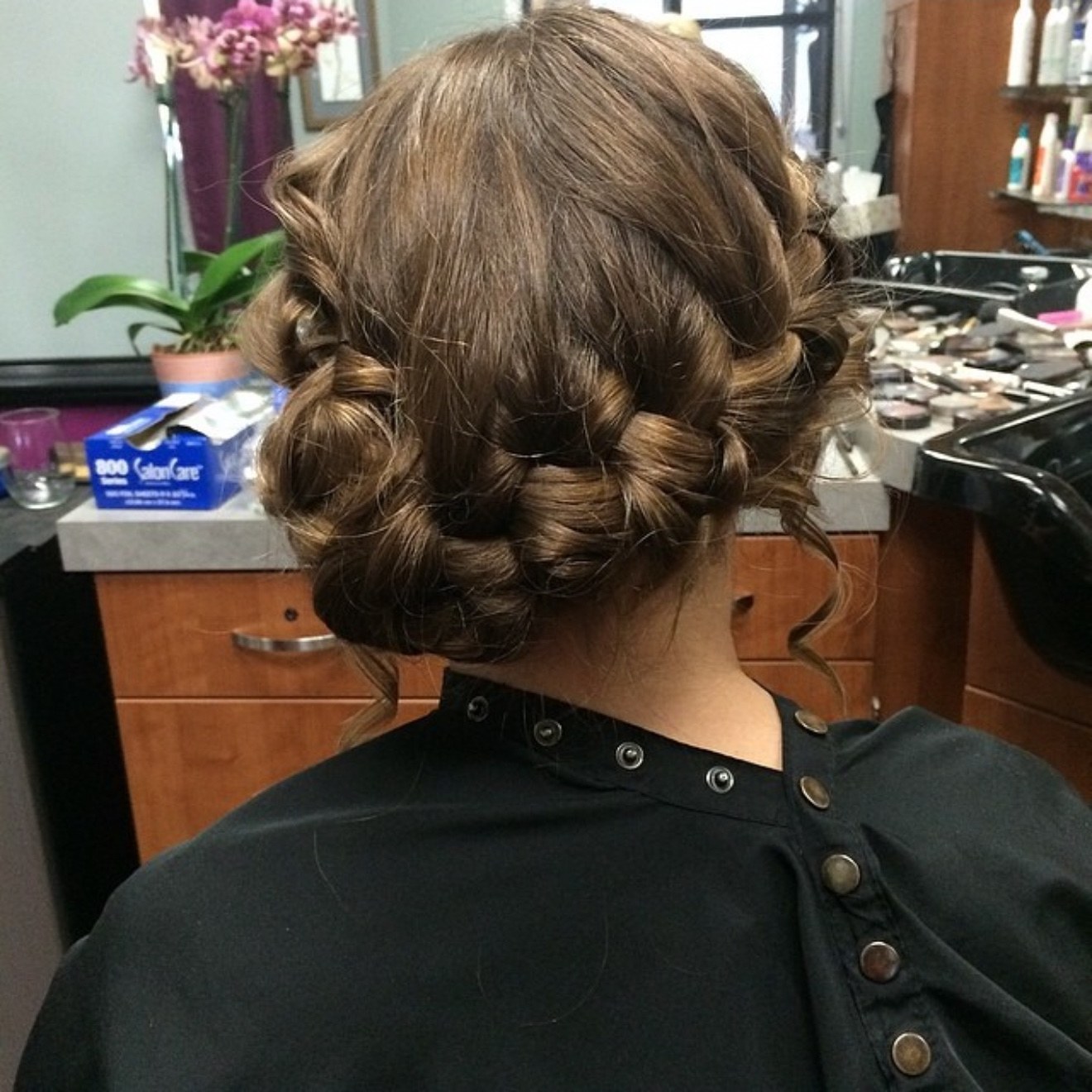 Braided bun prom updo, back view, by Heather at D&H Hair Company