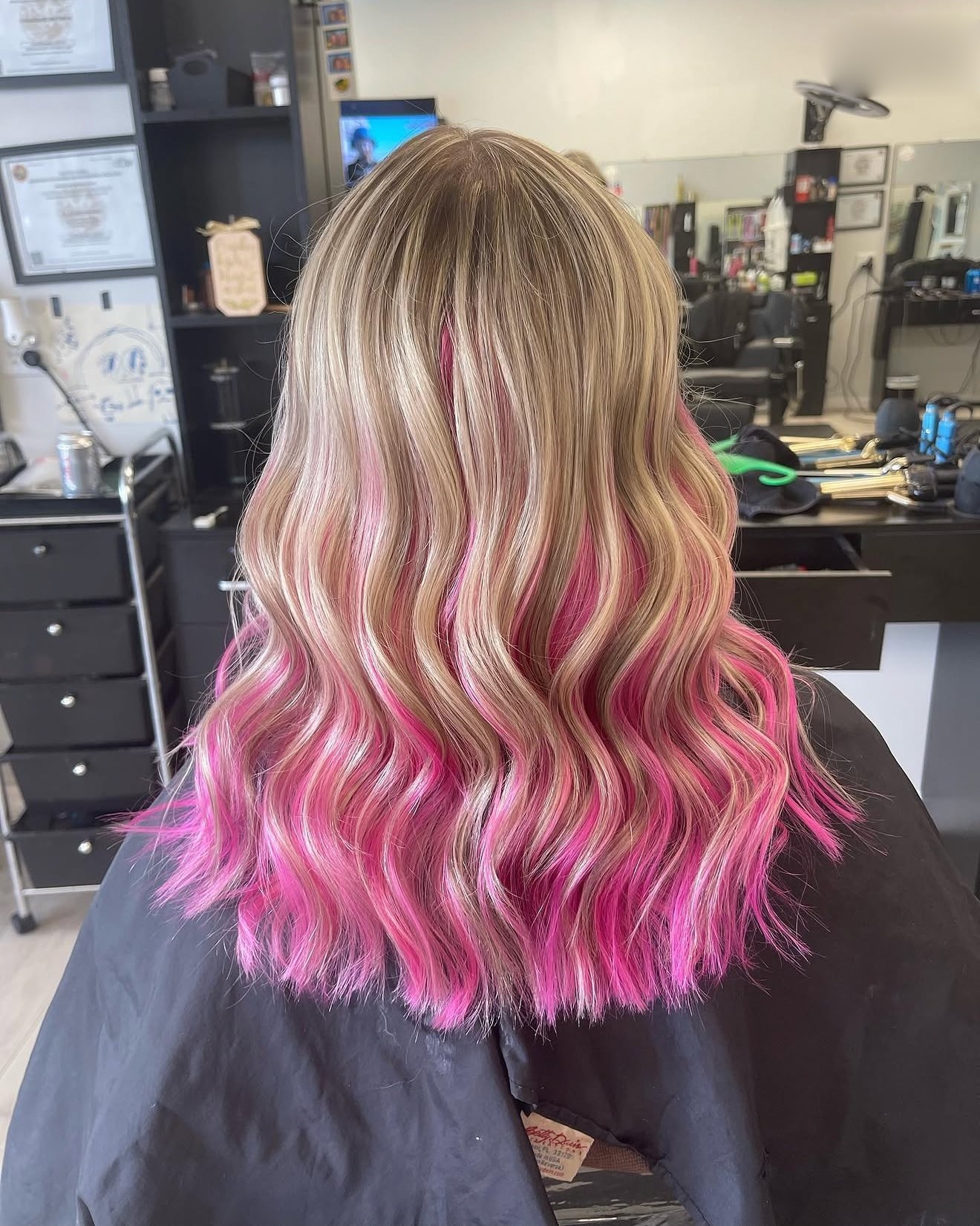 Blonde waves with pink vivid color, back view, by Heather at D&H Hair Company