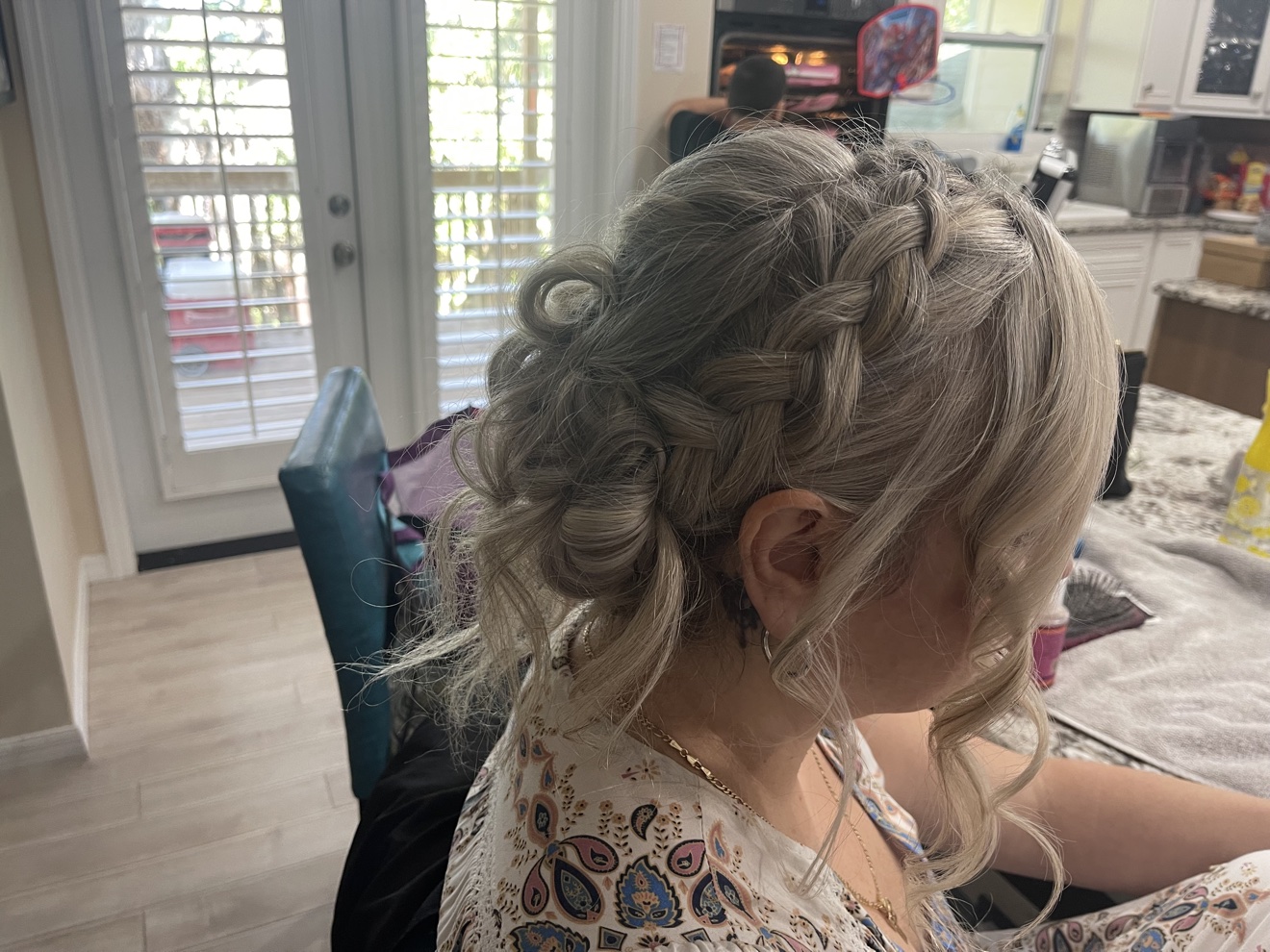 Braided silver blonde updo, side view, by Heather at D&H Hair Company