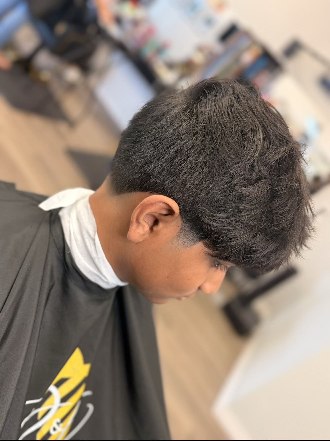 Textured crop haircut, side view, by Jacob at D&H Hair Company