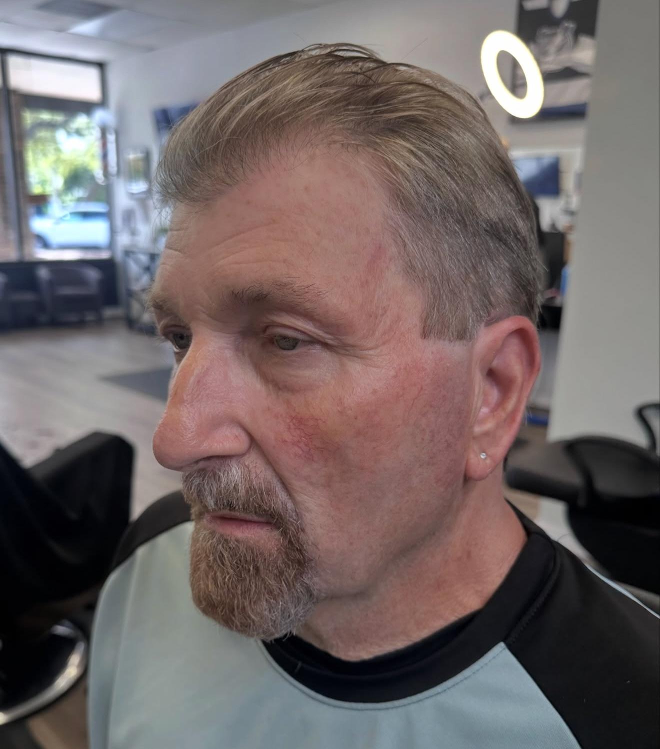Men&rsquo;s grey blending cut, side view, by Lauren at D&H Hair Company