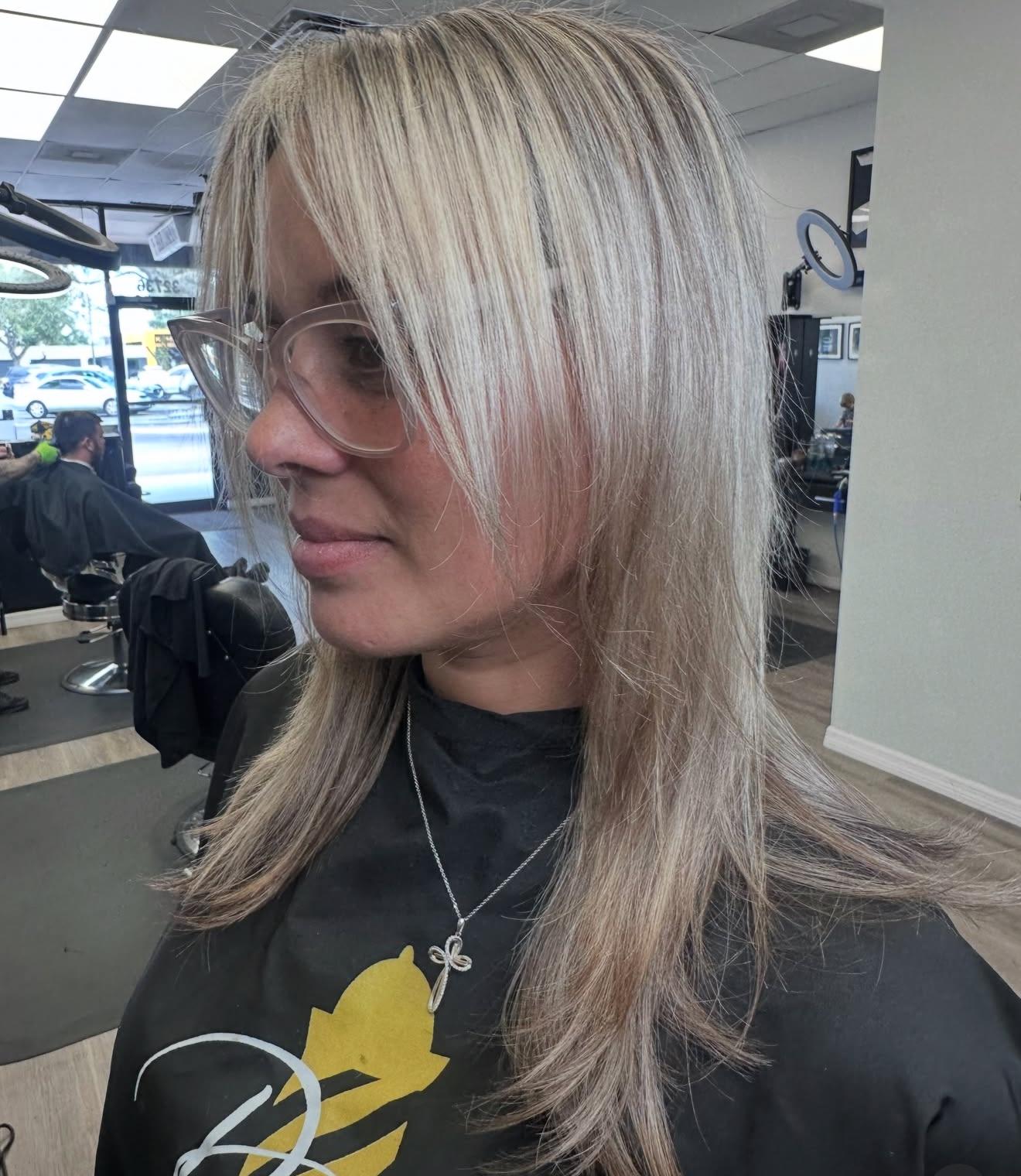 Fresh platinum blonde hair, side view, by Lauren at D&H Hair Company