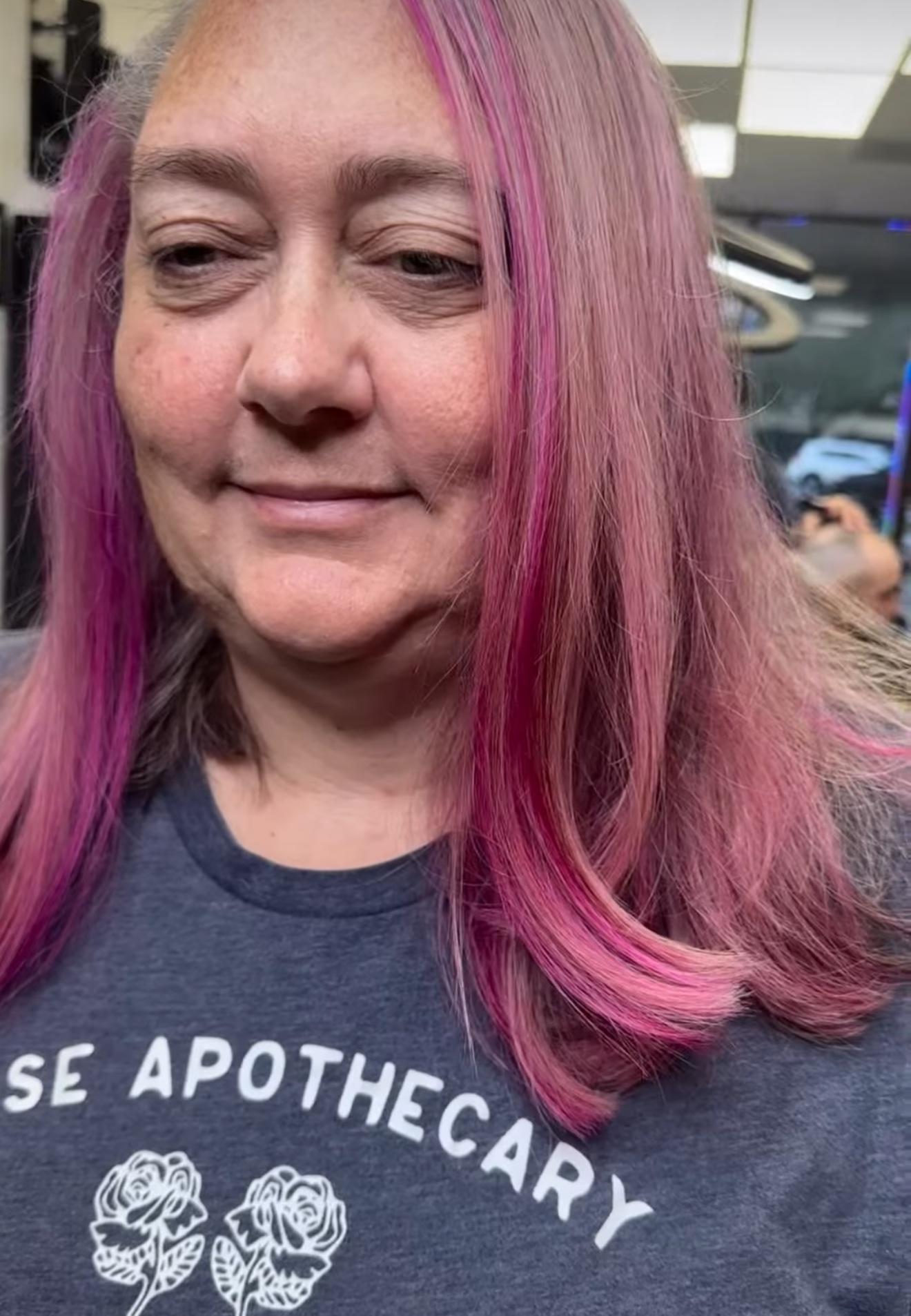 Bright pink hair, front view, by Lauren at D&H Hair Company