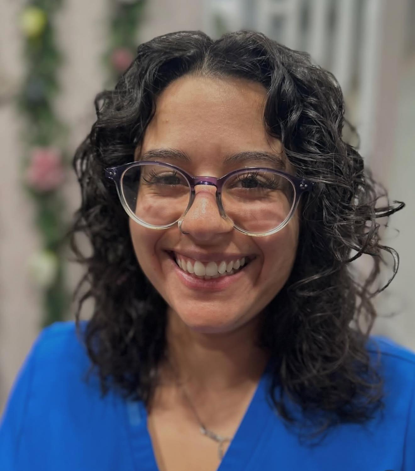 Dark curly hair with glasses, front view, by Lauren at D&H Hair Company