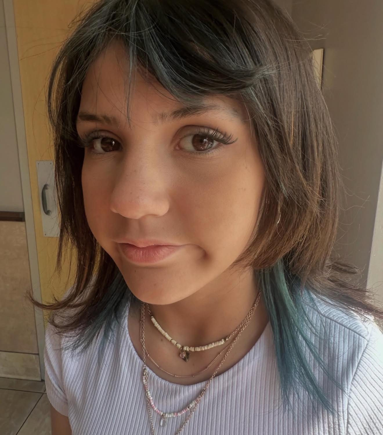 Dark hair with aqua peekaboo color, front view, by Lauren at D&H Hair Company