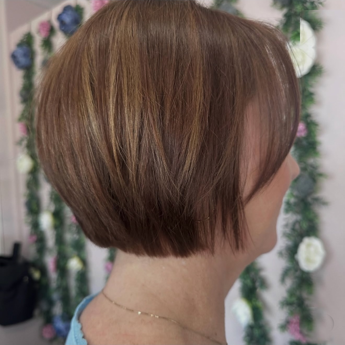 Dimensional brunette bob, back view, by Lauren at D&H Hair Company