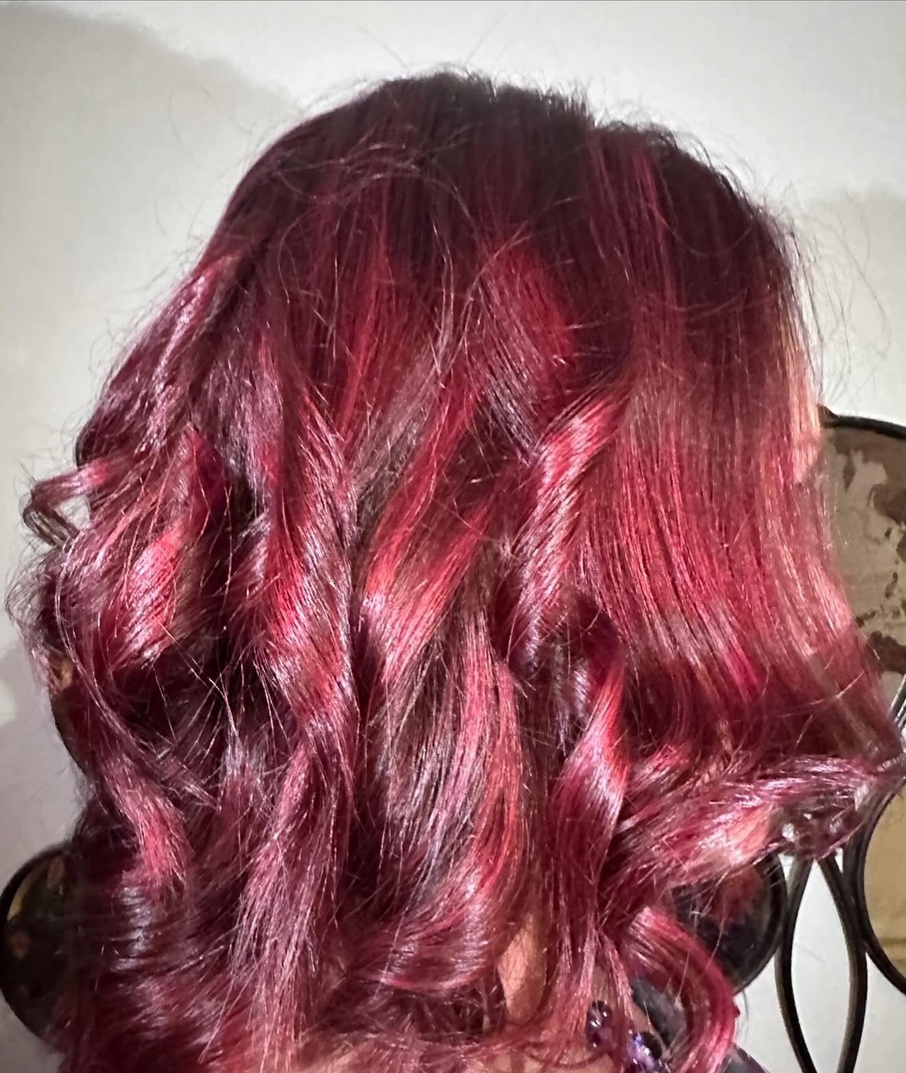Custom red wavy hair, back view, by Lauren at D&H Hair Company